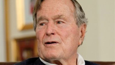 تايم: امرأة تتهم بوش الأب بالتحرش بها عام 2003