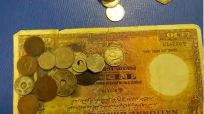 احباط تهريب 25 عملة أثرية بمطار القاهرة الدولى